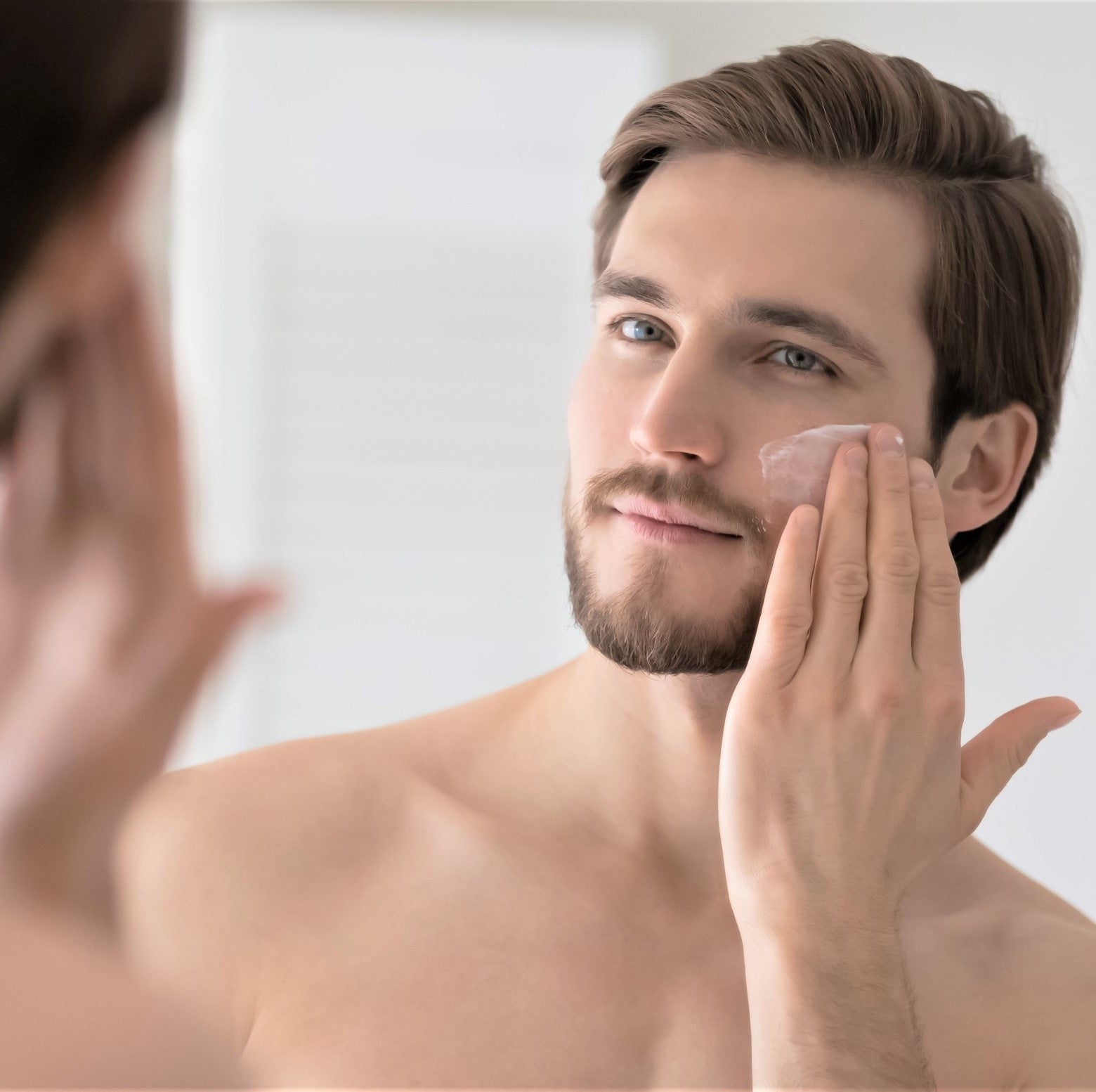 A man applies Dermaworks expert daily moisturiser for men to his face. Our anti-aging face cream for men helps to hydrate, brighten and reduce the appearance of wrinkles.