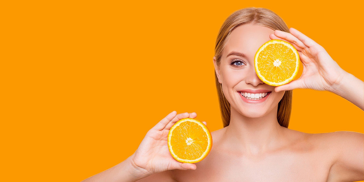 Woman with bright, glowing skin after using Dermaworks brightening collection
