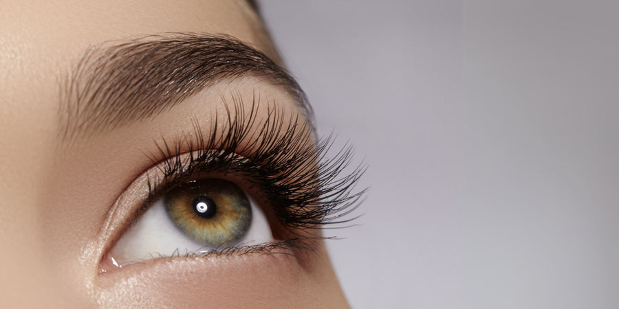 Woman with longer lashes and fuller brows after using Dermaworks lash and brow serums