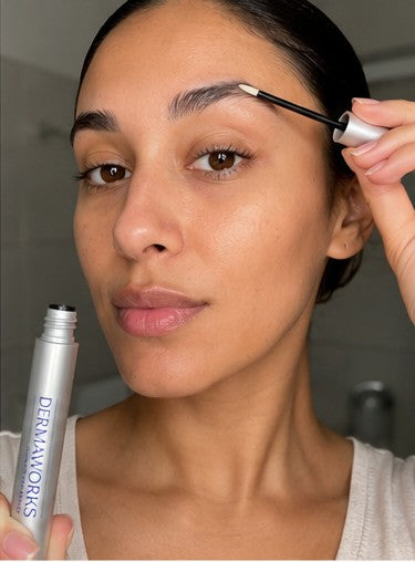Customer using Dermaworks Eyebrow Serum
